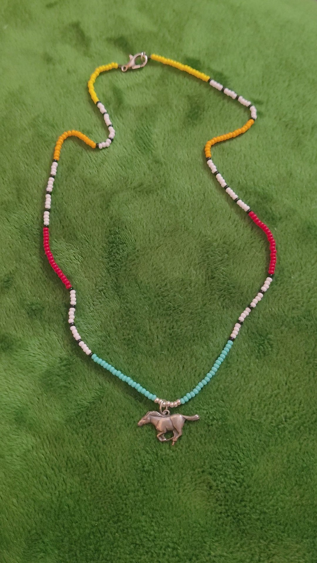 Canyon necklace with running horse charm
